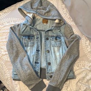 Denim jacket with sweater sleeves